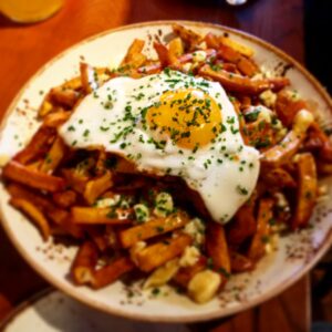 Poutine at Duckfat is just better with a duck egg on it