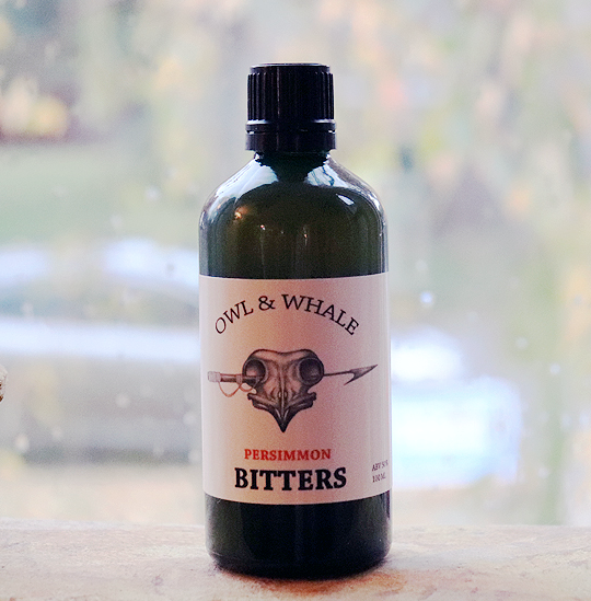 December's Eat Drink Lucky box features Owl & Whale Persimmon bitters