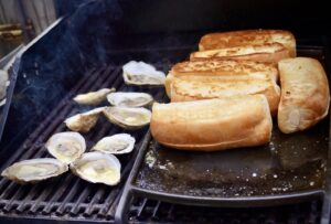 Yes, those are oysters on the grill you're looking at..Basecamp has it all!